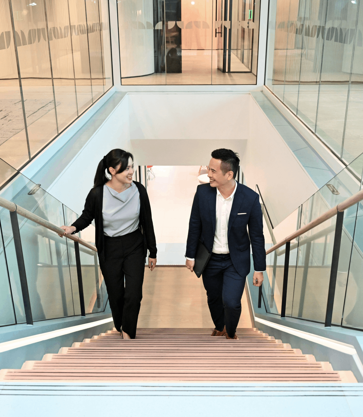 A team of business executives chatting happily in a business meeting